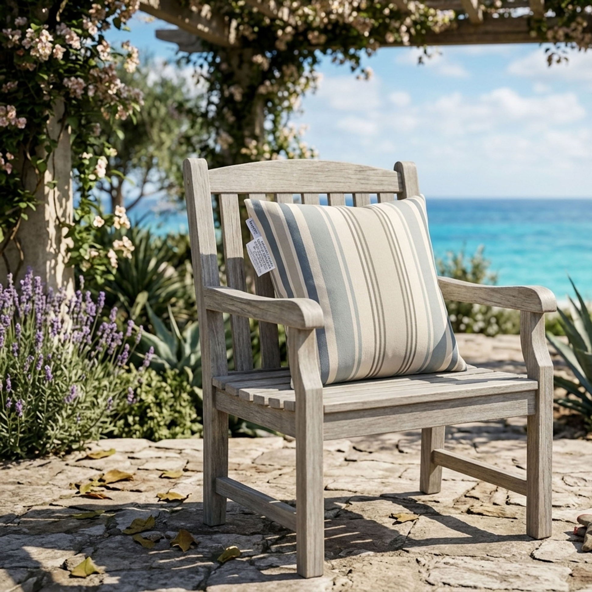 Wooden bench with a striped cushion in a garden setting with ocean view